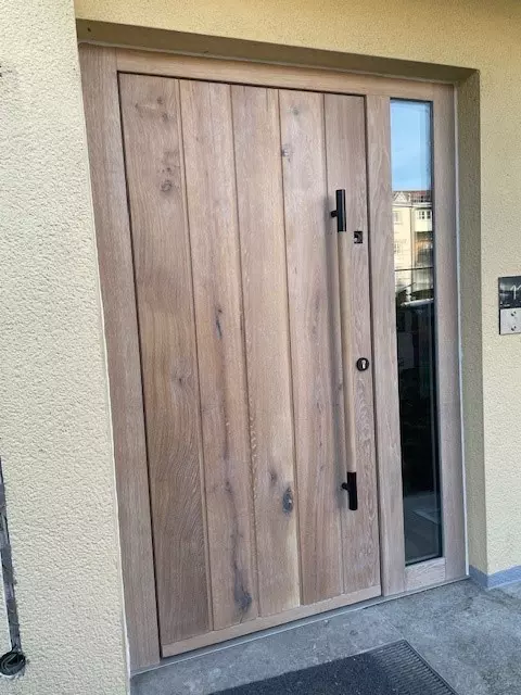 Dachsanierung, Holzwand, Sitzbank aus Holz, Holz Glas Miller in Sigmarszell